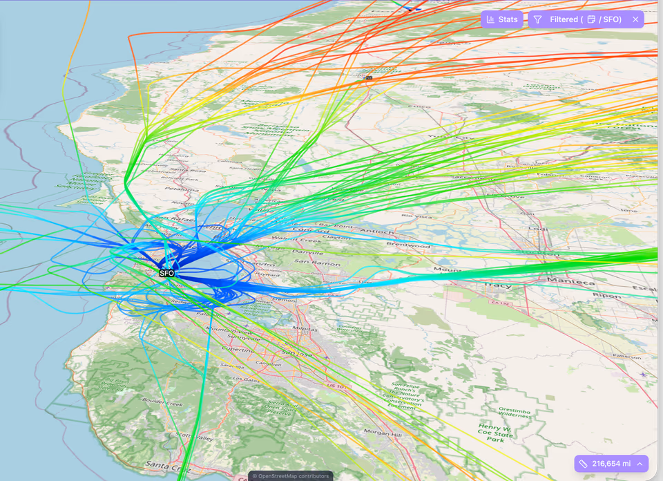A 3D-tilted map of the Bay Area with every SFO flight’s actual track radiating outward, colored by altitude from blue departures to red cruise